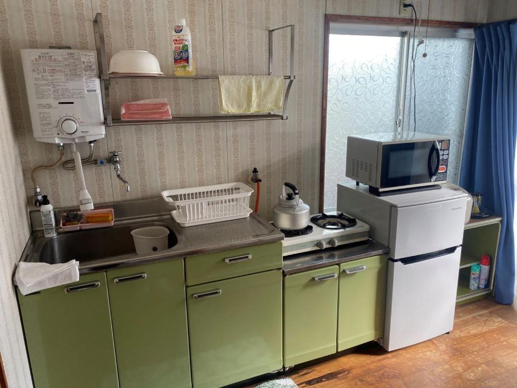Guest House Iwato Такачихо Екстериор снимка
